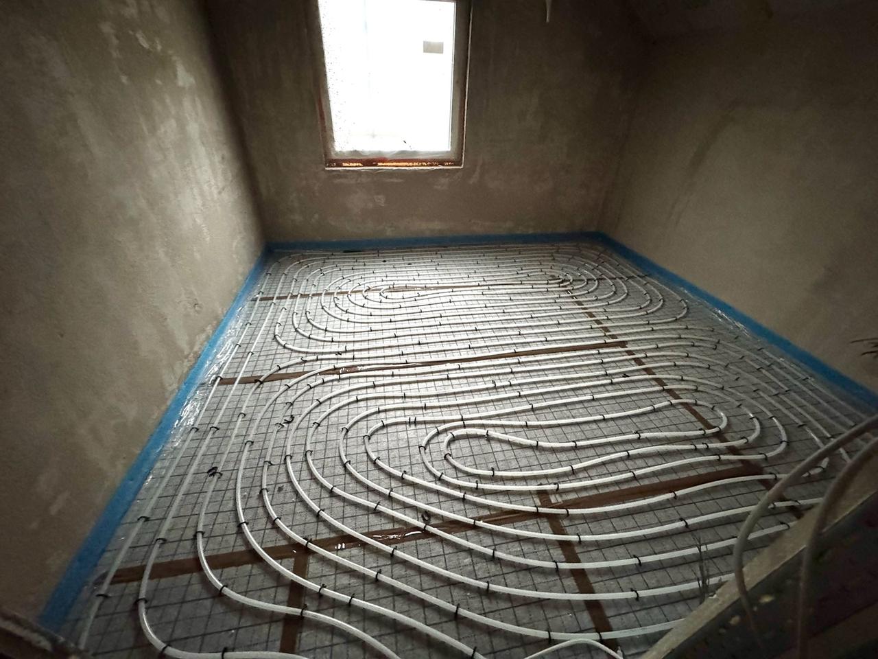 Referenzbild für präzise verlegte Flächenheizung im Rohbau